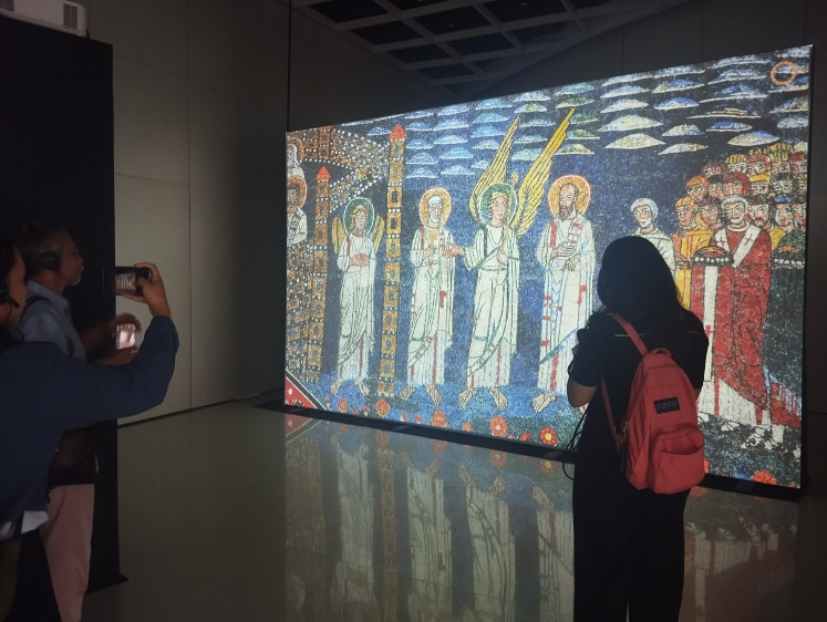 Timeless beauty: Visitors view a mosaic art on Aug. 6, 2024 in the “Mosaico: Italian Code of a Timeless Art” exhibition at Ciputra Artpreneur in Kuningan, South Jakarta, held to celebrate 75 years of bilateral relations between Indonesia and Italy.