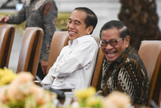 President Joko “Jokowi“ Widodo (left) sits next to Cabinet Secretary Pramono Anung on Aug. 27, 2024, ahead of a limited cabinet meeting at the Merdeka Palace in Jakarta on mpox mitigation and preparation for the second Indonesia-Africa Forum (IAF).