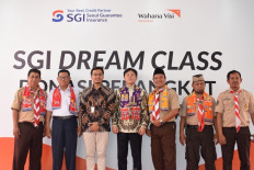 Wahana Visi Indonesia and SGI donate digital devices to schools in North Jakarta