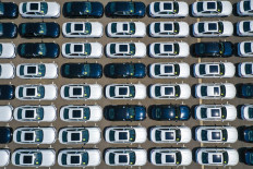 This aerial photo taken on June 28, 2024, shows newly-produced BMW cars parked at a factory in Shenyang, in China's northeastern Liaoning province.
