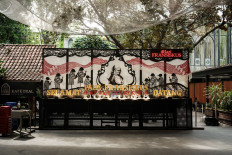 A welcoming signboard for Pope Francis is seen installed at the Jakarta Cathedral in Jakarta on August 30, 2024. By embarking aged 87 on the farthest journey of his papacy, Pope Francis is doing something some believed impossible -- and seeking to silence those who doubt his ability to fulfill his role. The pontiff's 12-day trip to Indonesia, Papua New Guinea, East Timor and Singapore starting next week involves 43 hours of flight time and a distance of 32,000 kilometers.