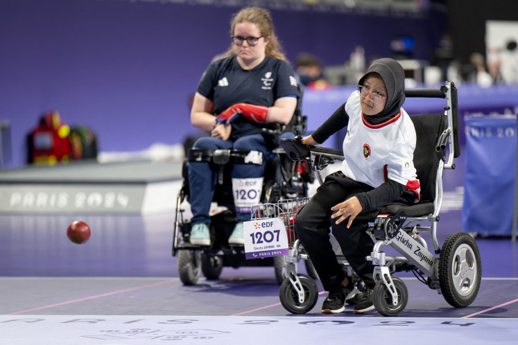 Indonesia's Gischa Zayana (right) competes against Britain's Claire Taggart (center) in the Women's Individual BC2 Boccia Bronze Medal match during the Paris 2024 Paralympic Games at the South Paris Arena in Paris on Sept. 1, 2024.