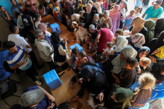 Palestinians gather for a polio vaccination campaign at a United Nations healthcare center in Deir Al-Balah in the central Gaza Strip on Sept. 1, 2024.