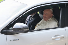 Pope Francis arrives for a ceremonial welcome at the Merdeka Palace in Jakarta on Sept. 4, 2024.