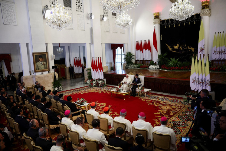 Pope Francis (front, second right) and President Joko “Jokowi“ Widodo (front, right) attend a meeting with Indonesian authorities, civil society and the diplomatic corps during his apostolic visit to Asia at the Merdeka Palace in Jakarta on Sept. 4, 2024.