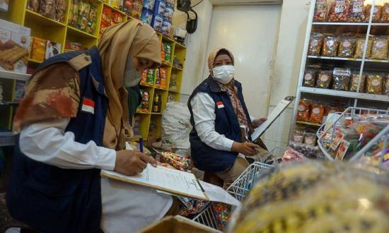 Routine check: Food and Drug Monitoring Agency (BPOM) officers conduct a routine field check on April 4, 2023, in a snack shop in Batang, Central Java.