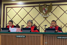 Judge Artha Theresia (center) reads out the bench's ruling in a case at the Jakarta High Court in Jakarta on Sept. 10, 2024. More than 1,700 judges in the country are set to stage an unofficial strike starting on Monday to demand higher salaries and benefits, which have been unchanged since 2012.