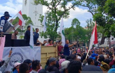 Hundreds of farmers grouped under Customary People and Farmer Alliance rally on June 10, 2024 outside the North Maluku gubernatorial office in Medan, North Sumatra, to demand fulfillment of the government’s land distribution program.
