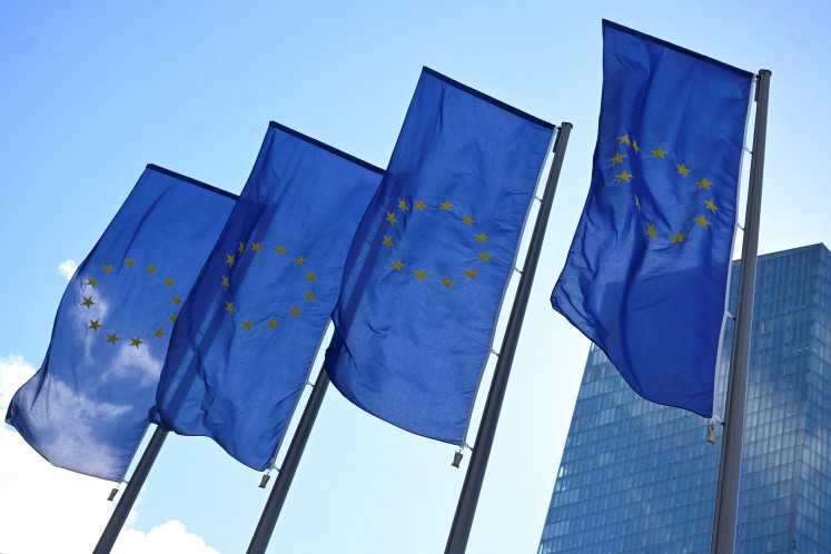 European Union flags flutter on the day European Central Bank (ECB) President Christine Lagarde speaks to reporters following the Governing Council's monetary policy meeting in Frankfurt, Germany, on Sept. 12, 2024.