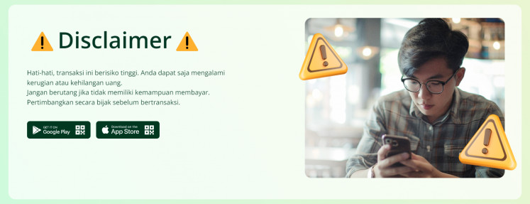 A full-page warning is displayed on a peer-to-peer (P2P) lending website in this screenshot taken on Sept. 13, 2024. The Financial Services Authority (OJK) and industry players have launched a new measure to discourage people from applying for loans they cannot repay.