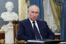 Russia's President Vladimir Putin attends a meeting with Chairman of the Constitutional Court Valery Zorkin in Saint Petersburg, Russia September 12, 2024. 