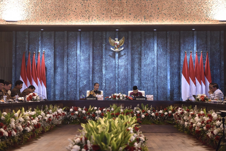 President Joko “Jokowi“ Widodo (fifth left) sits next to Vice President Ma'ruf Amin (third right) during the final cabinet meeting at the Garuda Palace in Nusantara Capital City (IKN), North Penajam Paser regency, East Kalimantan on Sept. 13, 2024. M Risyal Hidayat