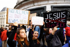 People attend a demonstration in support of rape victims and Gisele Pelicot, who was allegedly drugged and raped by men solicited by her husband Dominique Pelicot, as the trial continues, at the Place de la Republique in Paris, France, on Sept. 14, 2024.
