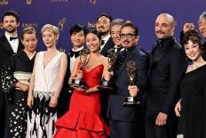 Japanese actor Hiroyuki Sanada (center), alongside cast and crew, winners of Outstanding Drama Series for “Shogun“ pose in the press room during the 76th Emmy Awards at the Peacock Theatre at LA Live in Los Angeles, US on September 15, 2024.