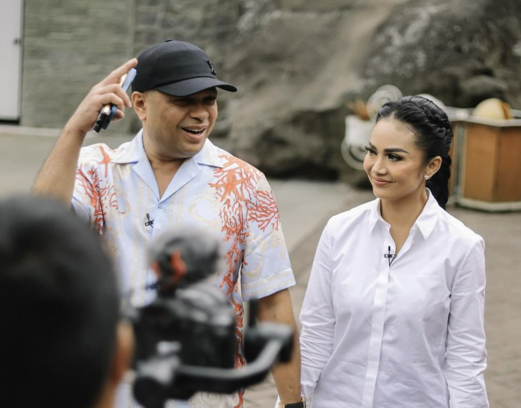 Singer Krisdayanti (center) poses in front of a camera as seen in an Instagram post on Sept. 14, 2024. Krisdayanti seeks to run as Batu Mayor in the November elections under the ticket of the Indonesian Democratic Party of Struggle (PDI-P).