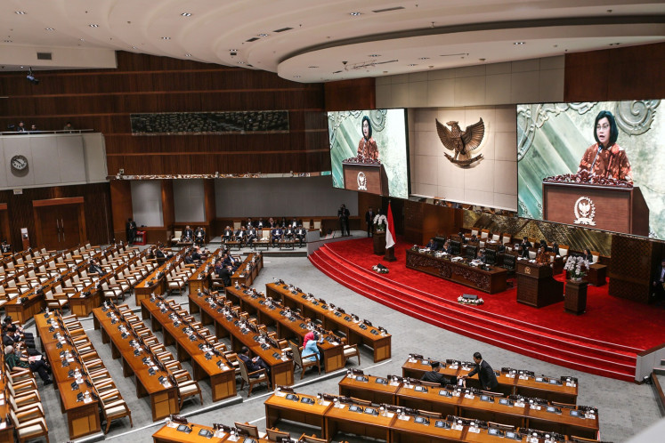 Finance Minister Sri Mulyani Indrawati delivers a speech on Sept. 3, 2024, during a House of Representatives plenary session at the Senayan legislative complex in Jakarta.