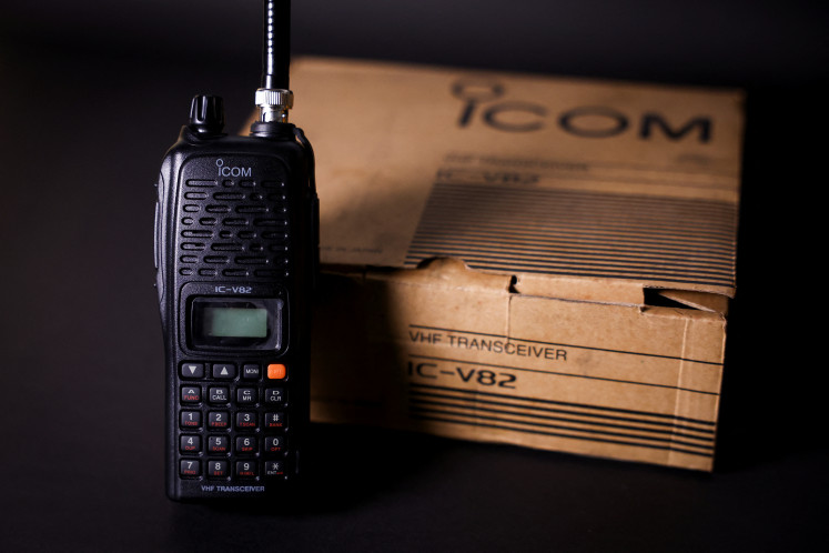 An ICOM IC-V82 radio is displayed next to its box, in this illustration, at a store in Manila, Philippines, September 19, 2024. 