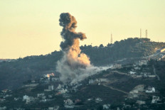 Smoke billows from the site of an Israeli strike that targeted the southern Lebanese village of Odaisseh near the border with Israel on September 18, 2024.