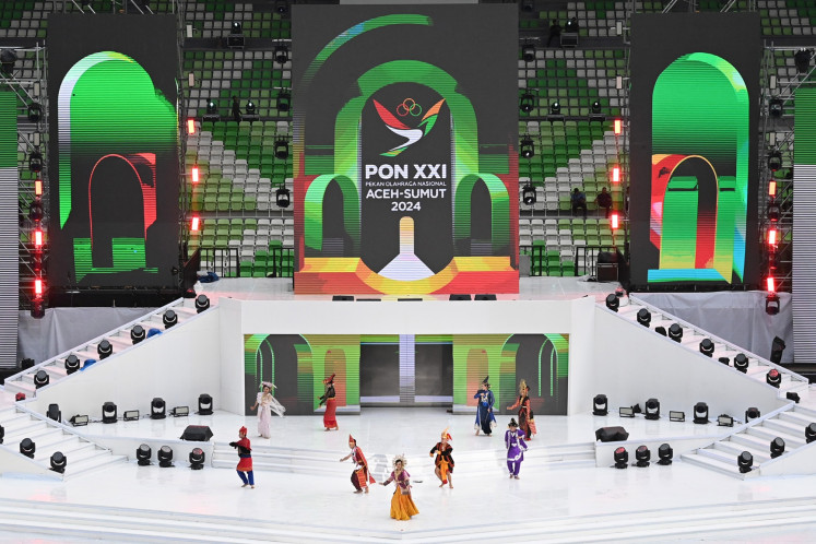 Dancers perform on stage during the closing ceremony of the 2024 National Games (PON) at the North Sumatra Main Stadium in Deli Serdang, North Sumatra, on Sept. 20, 2024. The ceremony marked the end of the 21st PON, jointly hosted by North Sumatra and Aceh, with the next edition to be held in West Nusa Tenggara (NTB) and East Nusa Tenggara (NTT) in 2028.