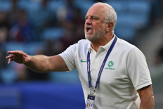 (Australian men's soccer team coach Graham Arnold reacts during the Qatar 2023 AFC Asian Cup Group B football match between Australia and Uzbekistan at the Al-Janoub Stadium in Al-Wakrah, south of Doha on Jan. 23, 2024.