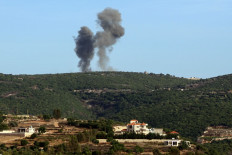 Smoke billows from the site of an Israeli airstrike that targeted an area on the outskirts of the Lebanese southern village of Yater on September 20, 2024, amid ongoing cross-border clashes between Israeli troops and Hezbollah fighters. 