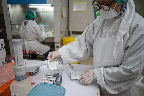 A technician runs a bacterial resistance test in a laboratory at Persahabatan Central General Hospital in Pulo Gadung, East Jakarta, in this undated photo.
