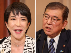This combination of file photos taken on September 14, 2024 shows Economic Security Minister Sanae Takaichi (left) and former defense minister Shigeru Ishiba (right) during a debate at the Nixon Kisha Club in Tokyo. Ishiba and Takaichi will face off after the first round of voting in the Liberal Democratic Party's (LDP) leadership election to determine who will lead the party and become the country's next prime minister, following the official count on September 27, 2024. 