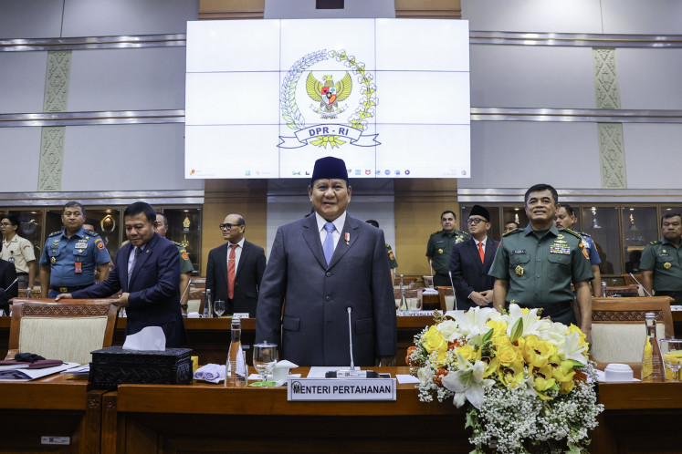 Defense Minister and president-elect Prabowo Subianto (center) attends a meeting with House of Representatives Commission I, which oversees defense and foreign affairs, at the Senayan legislative complex in Jakarta on Sept. 25.