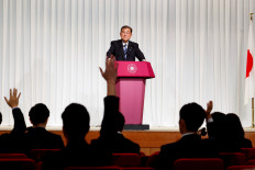 Shigeru Ishiba, the newly elected leader of Japan's ruling party, the Liberal Democratic Party (LDP), holds a press conference after the LDP leadership election in Tokyo on Sept. 27. 