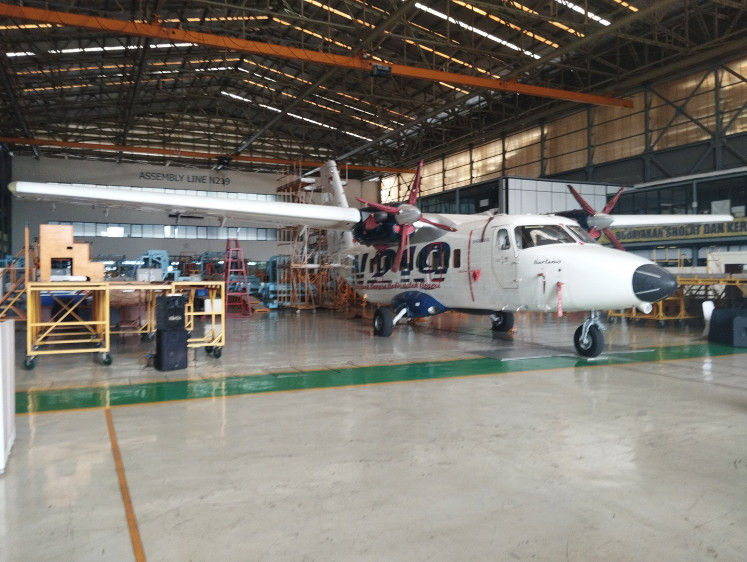 An N219 Nurtanio light transport aircraft is parked on Sept. 27, 2024 in a hangar at PT Dirgantara Indonesia (PTDI) in Bandung, West Java.