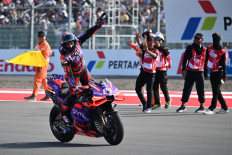 First-placed Prima Pramac Racing's Spanish rider Jorge Martin celebrates after winning the MotoGP race of the Indonesian Grand Prix at the Mandalika International Circuit in Mandalika, West Nusa Tenggara, on Sept.29, 2024.