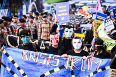 Activists take part in the Global Climate Strike  in Jakarta on Sept. 27, 2024. 