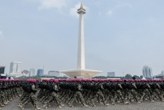 Soldiers march in a military parade marking the 79th anniversary of the Indonesian Military (TNI) in front of the National Monument (Monas) in Merdeka Square in Jakarta on Oct. 5, 2024.