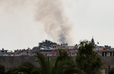  Smoke billows amid the ongoing hostilities between Hezbollah and Israeli forces, as seen from Tyre, southern Lebanon, October 7, 2024.