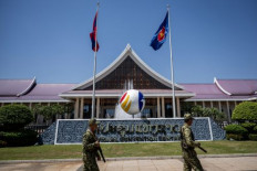 Maximum security: Security troops walk past the National Convention Center in Vientiane on Oct. 6, 2024. The center is hosting the ASEAN Summit, which will run until Friday.