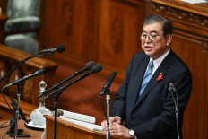 Japan's new Prime Minister Shigeru Ishiba delivers his inaugural policy address in the lower house of parliament in Tokyo on Oct. 4, 2024.
