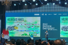 President Joko “Jokowi“ Widodo speaks on Oct. 8, 2024 before an audience of some 2,000 during the BNI Investor Daily Summit 2024 at the Jakarta Convention Center (JCC) in Tanah Abang, Central Jakarta.