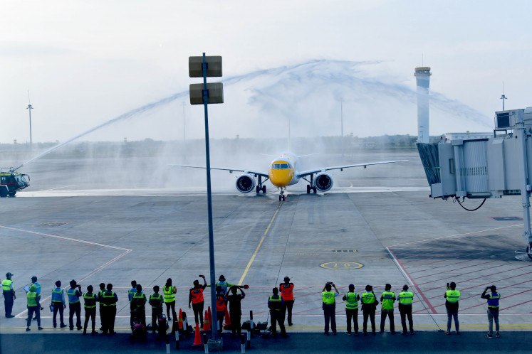 Welcoming salute: Singaporean low-cost carrier Scoot's  Embraer E190-E2 regional jet receives the customary water cannon salute at the Kertajati International Airport on its inaugural flight on Sept. 28, 2024. Scoot flies to Kertajati on Tuesday and Saturday. 
