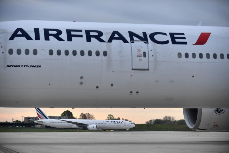 In this file photo, Air France planes arrive at Roissy-Charles-de-Gaulle airport in Roissy-en-France, near Paris, on April 26, 2023.