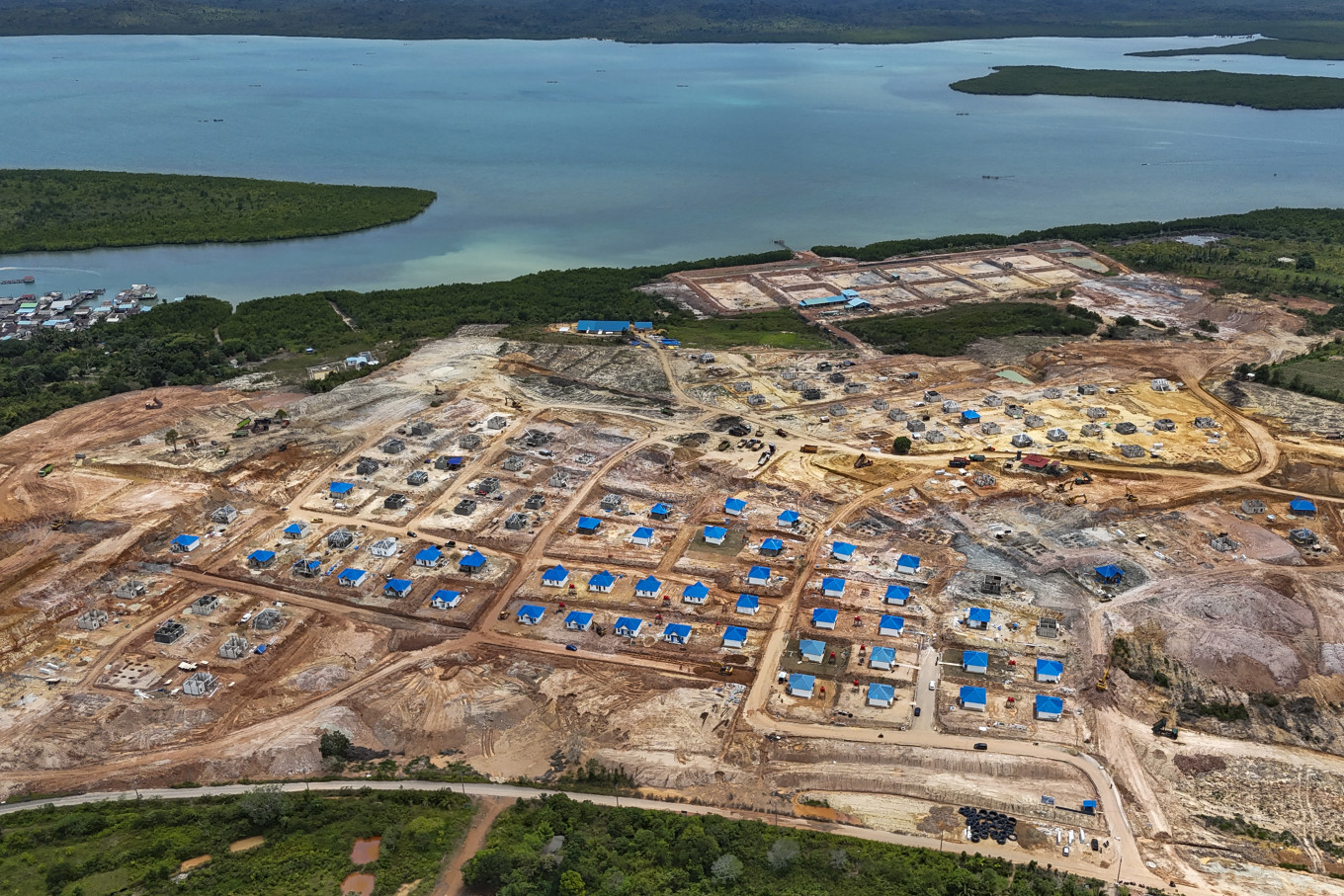 Houses for residents affected by the Rempang Eco City National Strategic Project are seen under construction on Oct. 2, 2024, in Tanjung Banun village, Rempang Island, Batam, Riau Islands. The Batam Business Agency (BP) said that as many as three of the 189 families who were relocated agreed to move to new housing. 