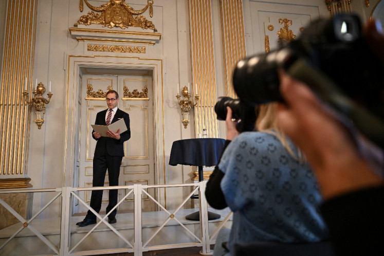 Permanent Secretary of the Swedish Academy Mats Malm (left) announces South Korean author Han Kang as the laureate of the 2024 Nobel Prize in Literature at the Swedish Academy in Stockholm, Sweden on Oct. 10, 2024. The Nobel Prize in Literature was awarded to South Korean author Han Kang, whose work confronts historical traumas and exposes the fragility of human life, who was honored “for her intense poetic prose that confronts historical traumas and exposes the fragility of human life,“ the Swedish Academy said.