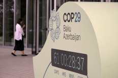 The COP29 climate conference countdown clock sits outside the COP29 headquarters in the Azerbaijani capital of Baku on Sept. 11, 2024. The 2024 UN Climate Change Conference (UNFCCC COP 29) will convene from Nov. 11 to 22, 2024 in Baku.