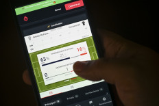 The app of the betting company Bet Nacional is displayed on a smartphone showing a match of the Brazilian national football championship open for betting in Rio de Janeiro, Brazil, on Oct. 2, 2024. As a matter of urgency, the Brazilian public authorities are seeking to regulate the online gambling activity that has been operating practically without law or order since 2018 and that the Minister of Finance, Fernando Haddad, labeled as a “pandemic.“