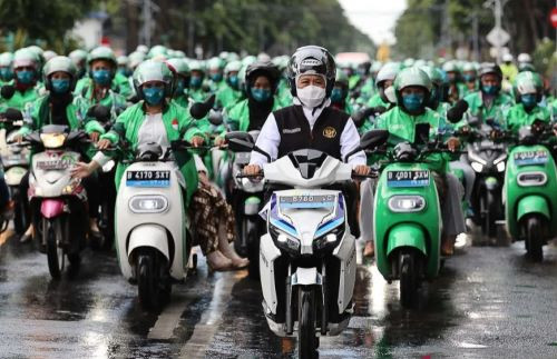 Female ojol (online motorbike transportation) drivers participate in a motorcade on April 21, 2024, organized by the East Java provincial administration in Surabaya, as part of Kartini Day, a day dedicated to the fight for gender equality.