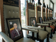 This photo taken on September 12, 2024 shows portraits of Timor Leste's President Jose Ramos-Horta (left), Prime Minister Xanana Gusmao (2nd left) and others at the Timorese Resistance Archive and Museum, which documents the history of the resistance of the Timor Leste's people during the Indonesian occupation, in Dili.