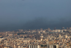 Smoke rises from the site of an Israeli airstrike that targeted a neighborhood in Beirut's southern suburbs on October 16, 2024.