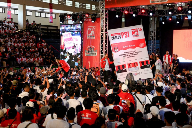 Kaesang Pangarep (center), chair of the Indonesian Solidarity Party (PSI) and the youngest son of President Joko “Jokowi“ Widodo, speaks on Feb. 5, 2024, during a campaign event supporting presidential candidate pair Prabowo Subianto and Gibran Rakabuming Raka at the Ngurah Rai Sports Arena in Denpasar, Bali.
