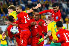 Bahrain's players (from left to right) Ali Haram, Vincent Emmanuel and Adulla Alkhalasi compete during the 2026 FIFA World Cup Asian qualifiers soccer match between Australia and Bahrain at Cbus Super Stadium on the Gold Coast, Australia on Sept. 5, 2024.