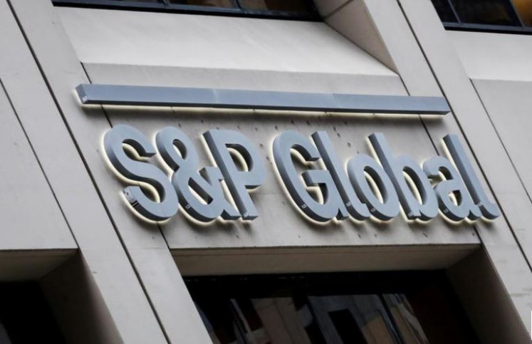 The credit rating agency's logo appears on the fronticepiece of the S&P Global headquarters on Dec. 13, 2018, in the financial district of New York City, the United States.