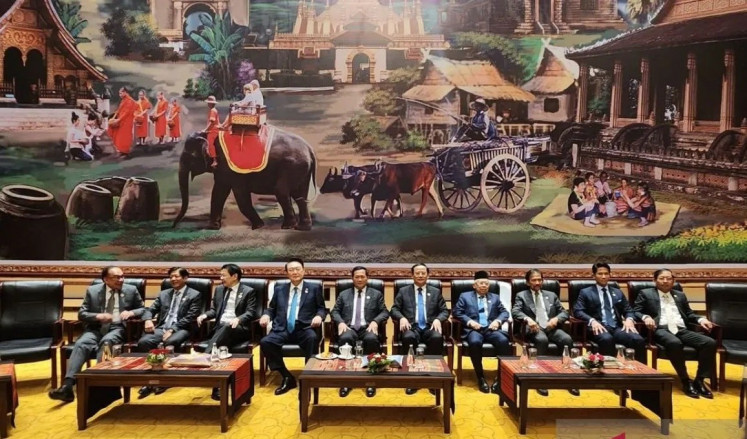 Sitting pretty: Leaders of ASEAN and China pose for a group photo after the ASEAN-China Summit as part of the 45th ASEAN Summit in Vientiane, on Oct. 10, 2024. 